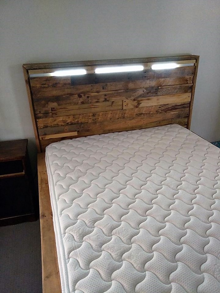 pallets bed headboard with head light